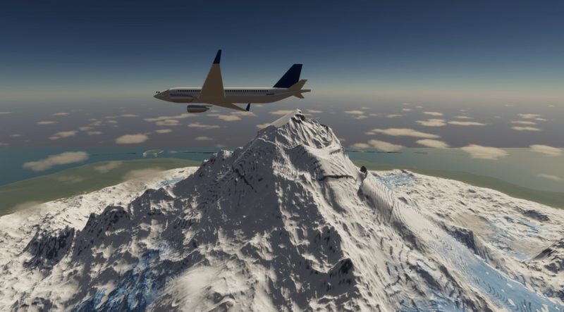 Another pass over the summit: the airliner level with the snowy peak