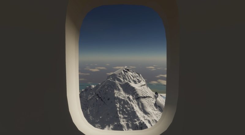 Window seat: looking out of an airliner window at a snowy peak below